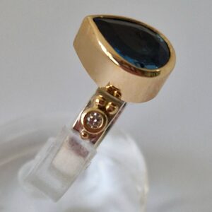 London blue topaz and diamond ring set in recycled 18ct gold. - Image 2