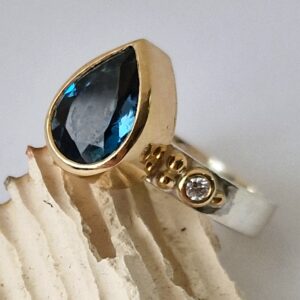 London blue topaz and diamond ring set in recycled 18ct gold. - Image 3