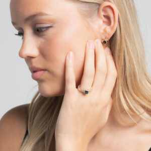 18ct gold, London blue topaz and diamond earrings.