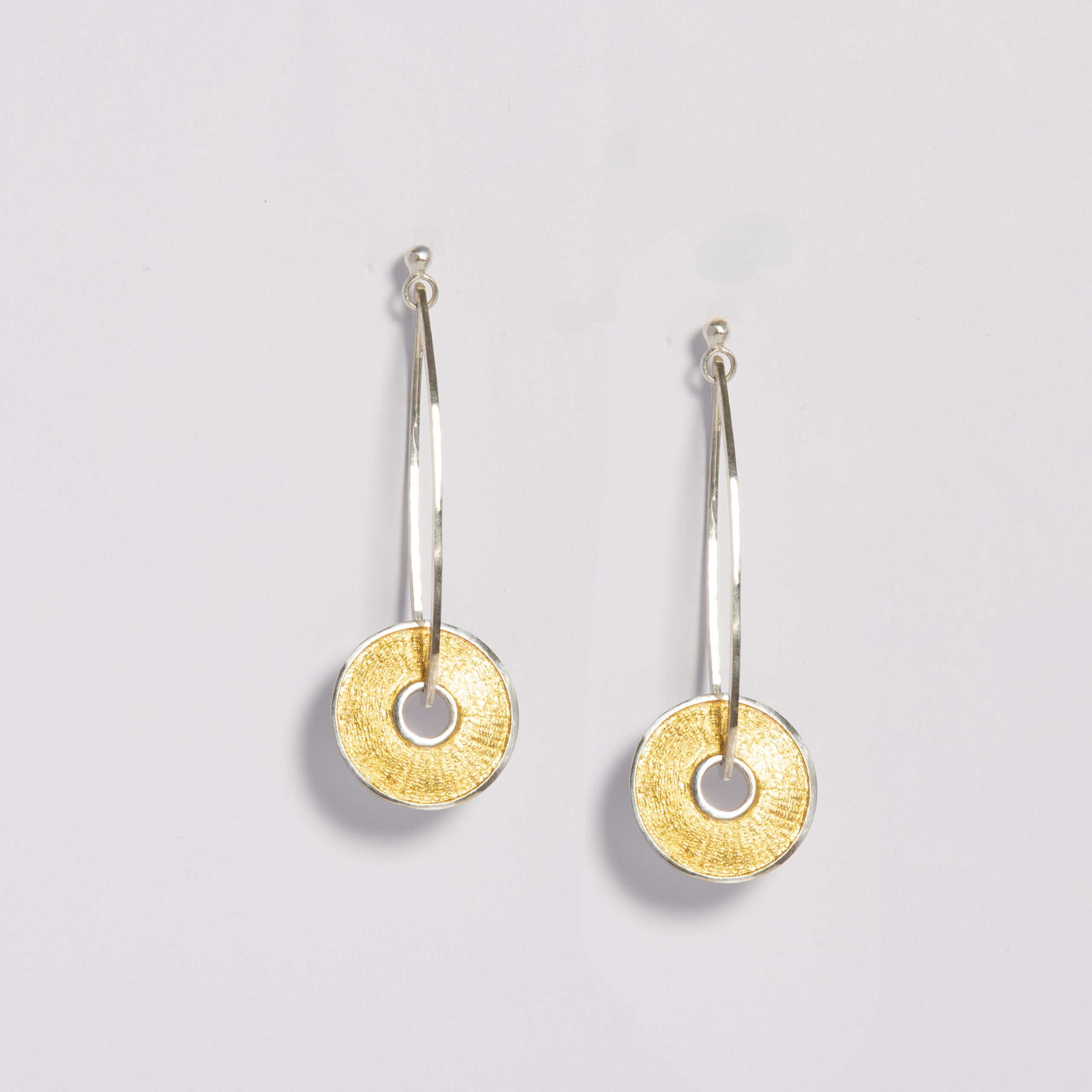 Gold and silver dangle earrings