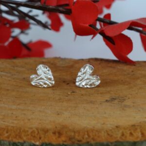 Wee silver textured hearts