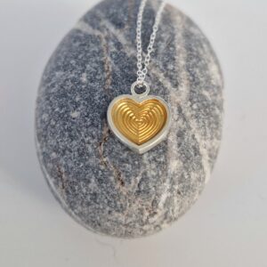Silver engraved heart pendant with 24ct gold plating.