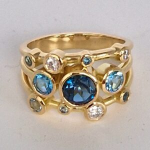 18ct gold topaz and diamond ring