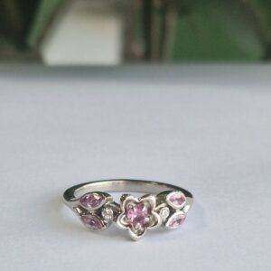 Stunning pink sapphire and diamond, platinium engagement ring