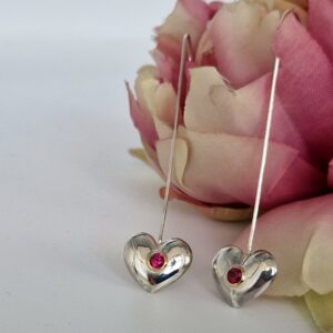Dangle silver heart earrings, with rubies set in 18ct gold