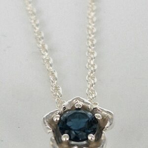 London blue topaz and silver flower pendant